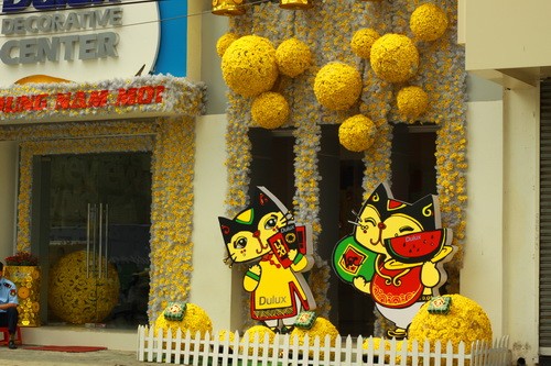 Đường phố Sài Gòn rực rỡ đón Xuân về ảnh 19
